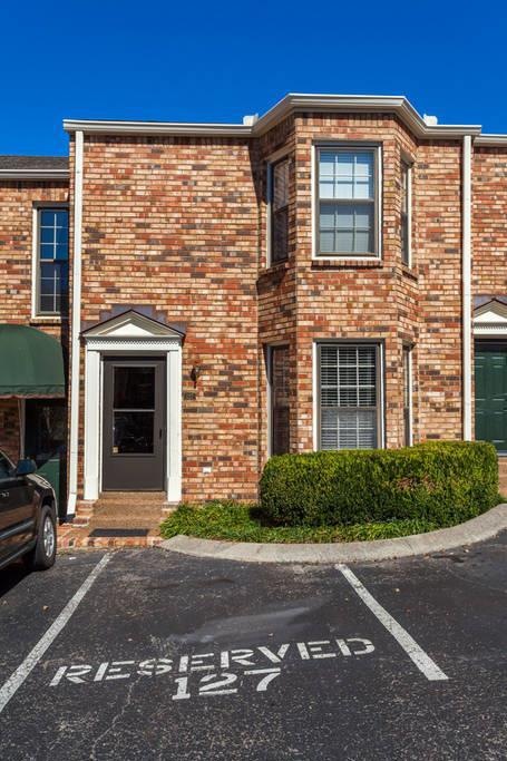 All brick condo with beautiful bay windows! Reserved parking spot in front of condo, with plenty of open parking spots for guests.