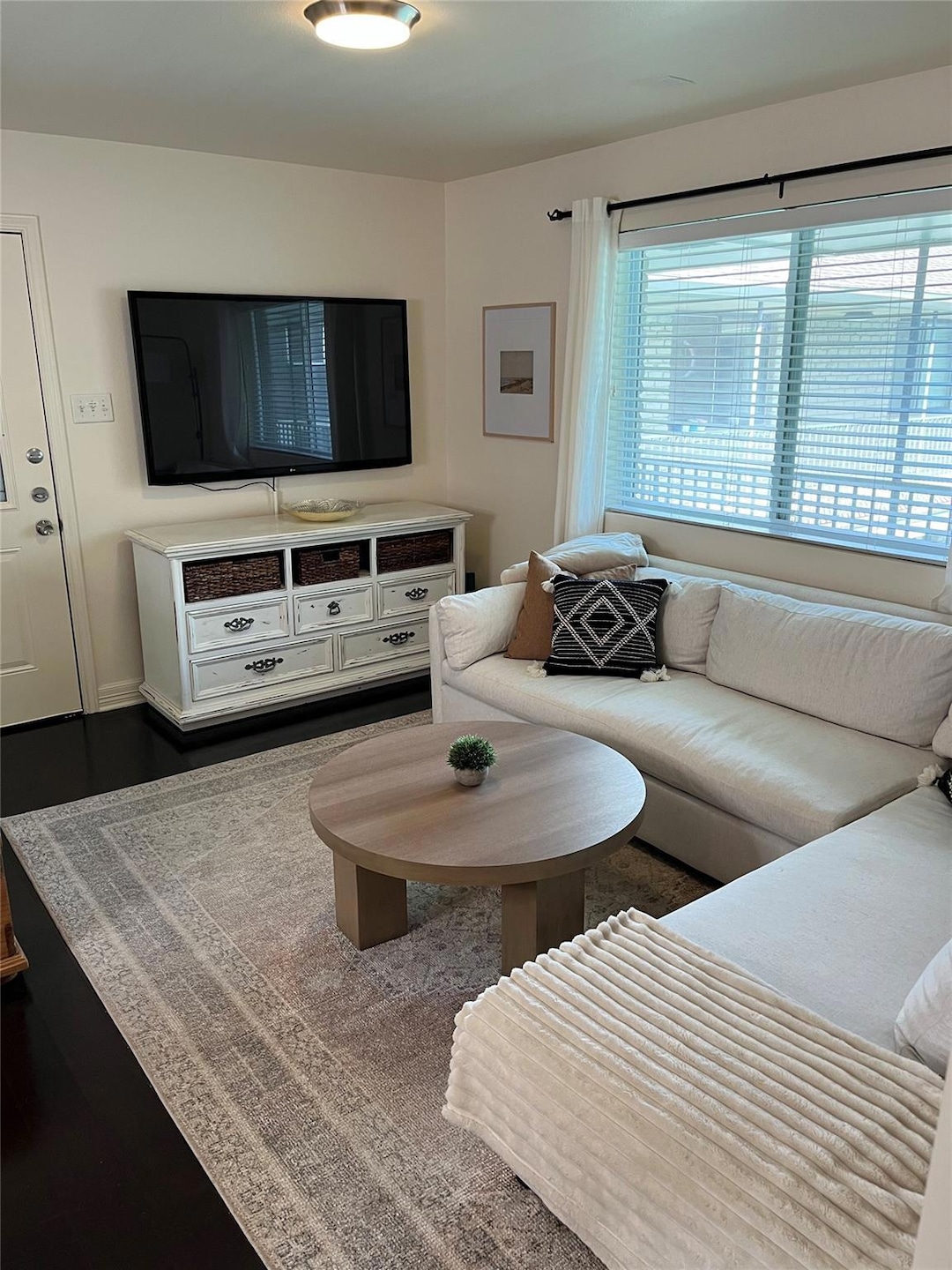 Living area featuring dark wood finished floors