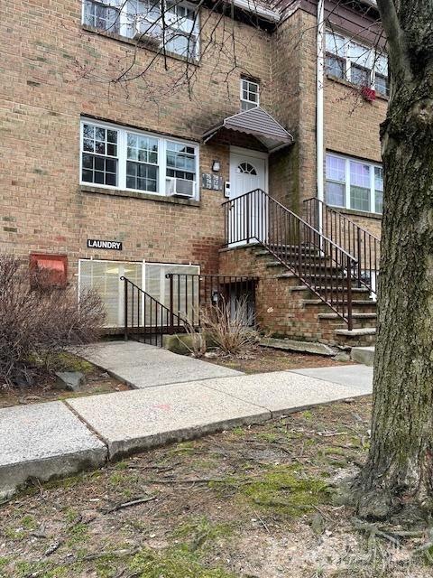 Front view of property and entrance to unit (going downstairs)
