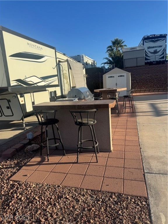 View of patio with area for grilling