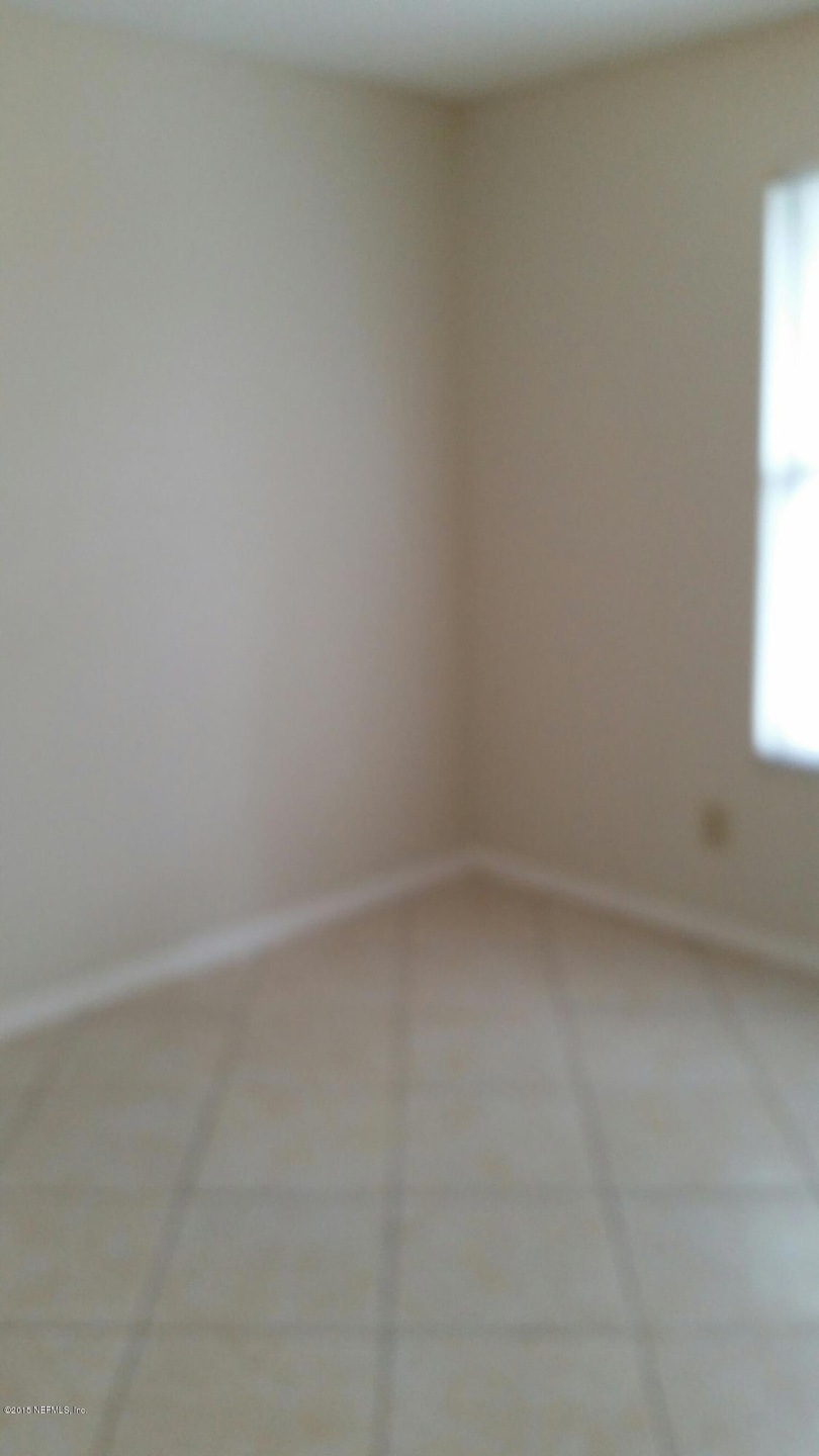 5135 Indian Lakes Ct unit 4, Jacksonville, FL 32210 - photo 1