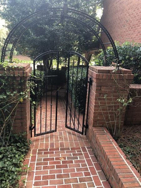 Three Stunning Iron Gates on Property.