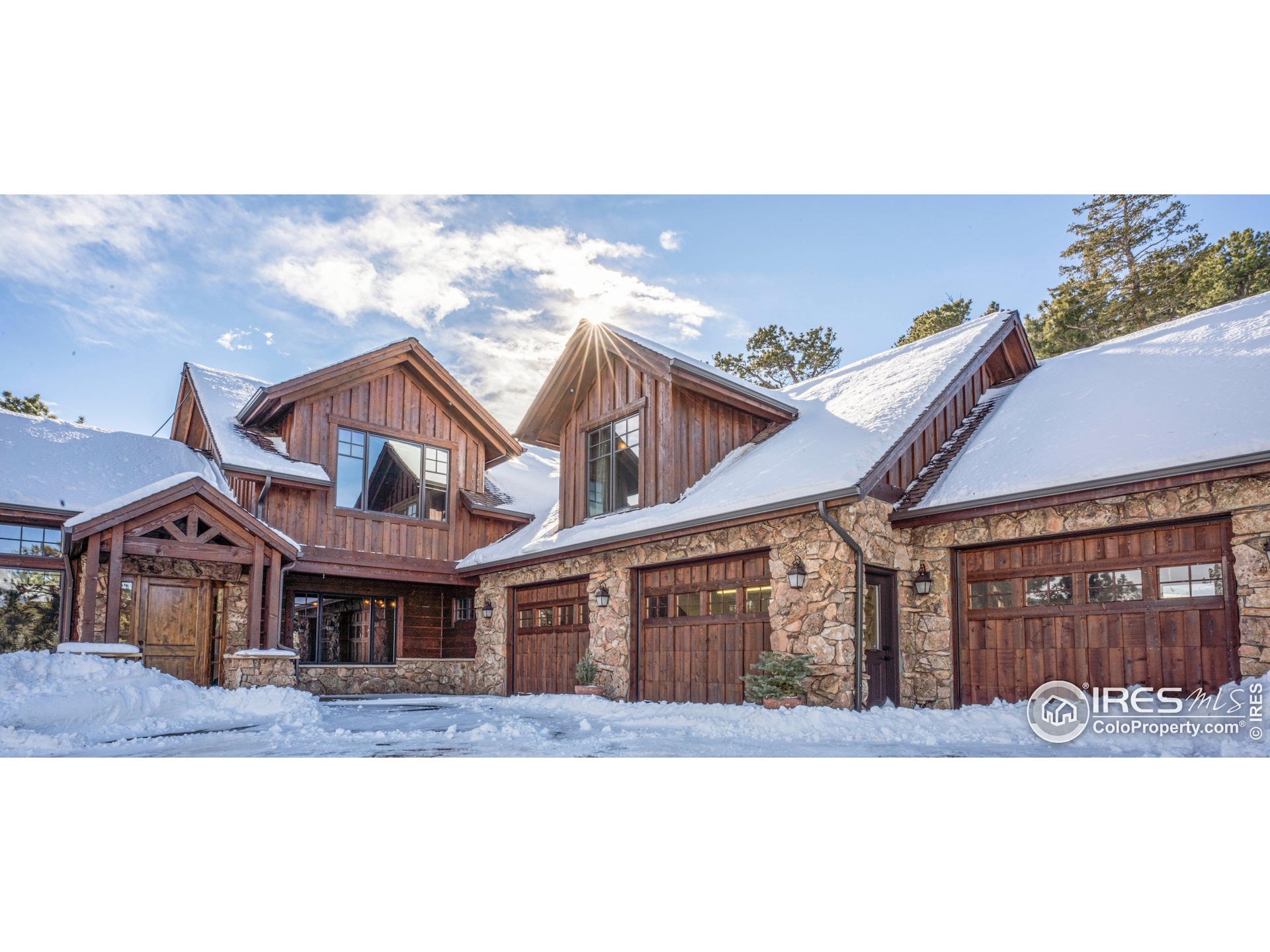 Front of house with attached, heated 3-car garage
