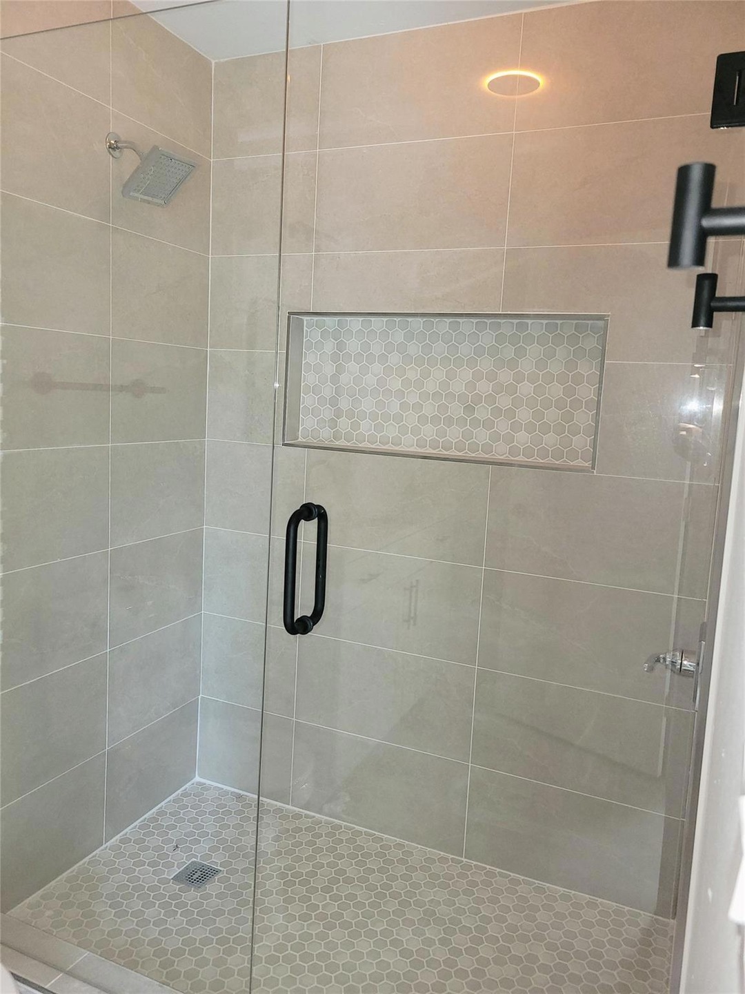Oversized luxury master shower with seamless glass