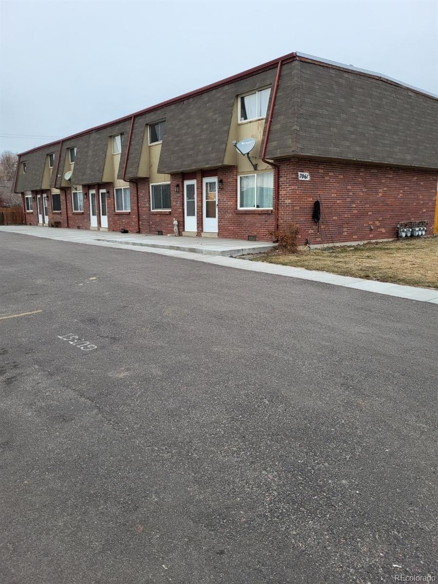 SOLID BRICK WITH NEWER ROOF/LOT