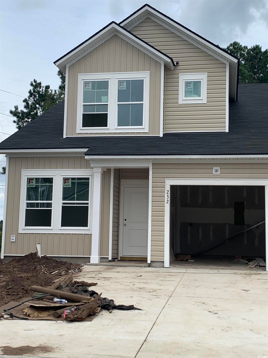 View of front facade with a garage