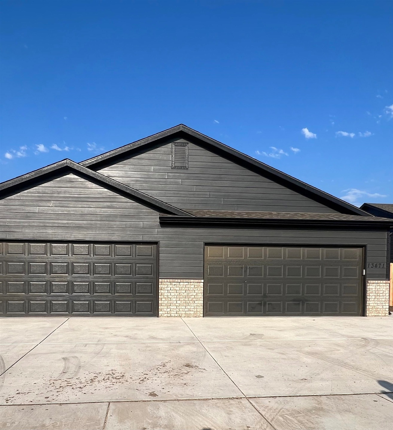 Garage featuring driveway