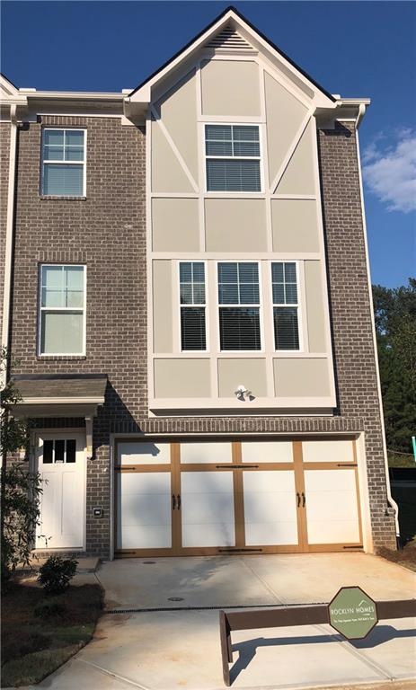 Lot 66 Exterior. Front door and Garage door are to