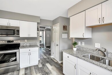 kitchen with stainless appliances and granite coun