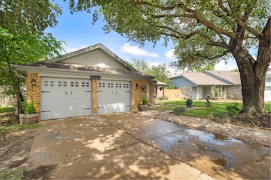Spacious two-car garage with a wide driveway for e