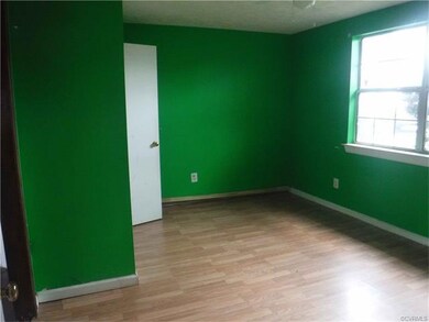 Room that opens up to the family room om the lower
