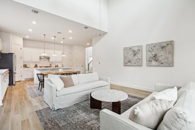 Living area with light wood-type flooring, recess