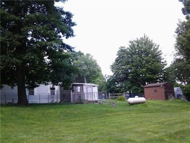 Exterior Front. View of back.  Dog kennels can be 