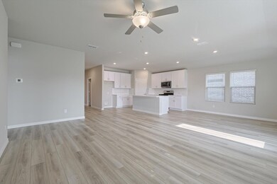 The beautiful open floor plan sets a welcoming tone for entertaining or family fun.