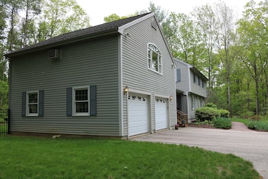 two car attached garage with finished room above