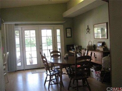 The dining area looks out into the covered concret