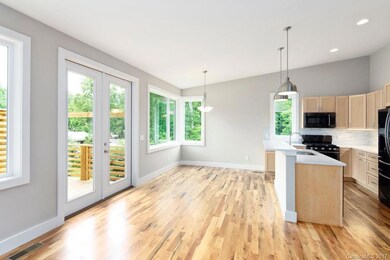 Glass Doors to Deck Bring Nature In