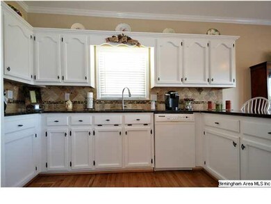 GREAT kitchen features Granite counters with tile 