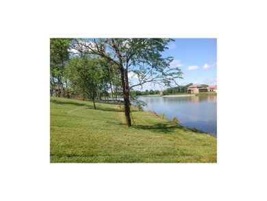 Back of yard extends down to Lake Creekmoor. Homeo
