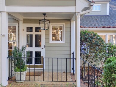 Covered front entry with 6-light 
