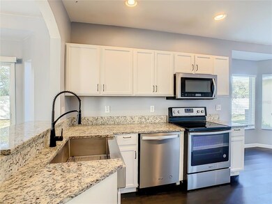 10230 Perthshire Cir, Land O Lakes, FL 34638 - photo 2