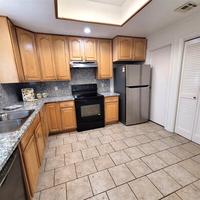 You will appreciate the solid wood cabinets by Kra