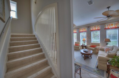 Natural light floods staircase
