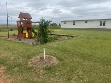 View of yard with a playground