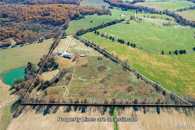 Overview of rural landscape with a nearby body of water