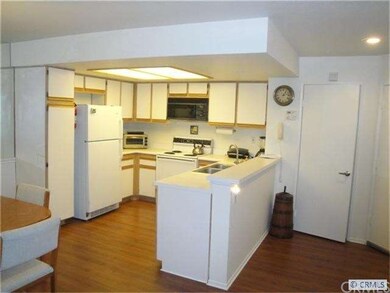Open kitchen with breakfast counter