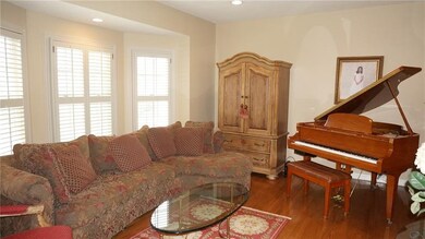 Living Room - Recessed lighting, neutral dcor.
