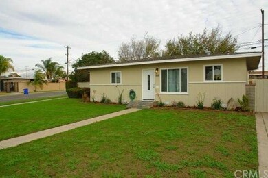 Large corner lot with Sprinklers in the front.
