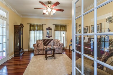 This is a view of the Office/Music from the Great Room. French Doors lead to the Foyer and the other French doors open to the Great Room. 