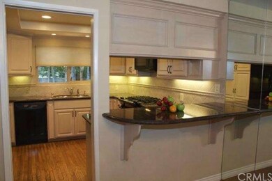 Kitchen opens to dining room.