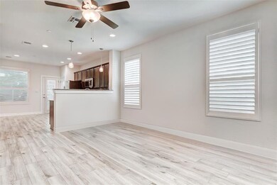 Unfurnished living room featuring light wood-type