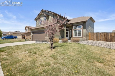 Craftsman-style 2 story home featuring a tree and 