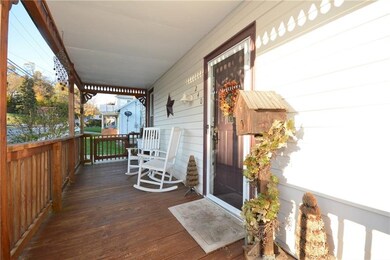 Nice Large covered front porch, gated for pets/kid