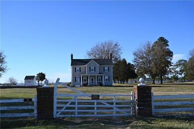 The point area is fenced and has 2 vehicle entry g