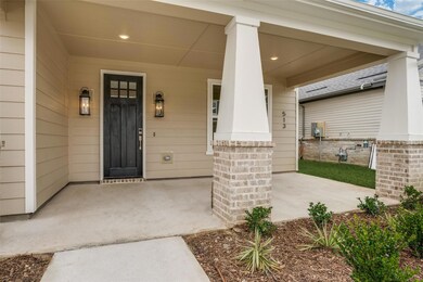 Entrance to property with covered porch