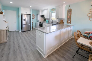 Kitchen featuring appliances with stainless steel 