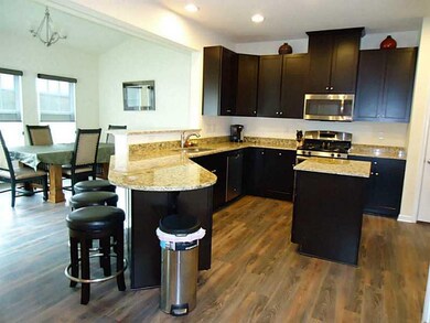 Kitchen. GRANITE COUNTER TOPS WITH STAINLESS STEEL