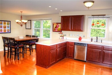 Updated kitchen with solid surface counter tops