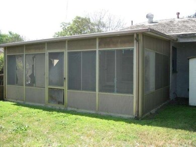 Enclosed patio constructed 1978 with city permit
