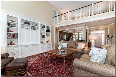 The great room enjoys built-in cabinetry, ideal fo