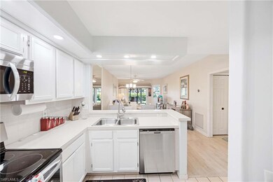 Kitchen featuring stainless steel appliances, a pe