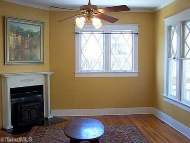 Living Room. Lots of natural light & fireplace