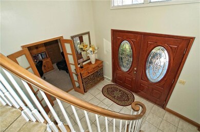 2 story foyer with curved staircase
