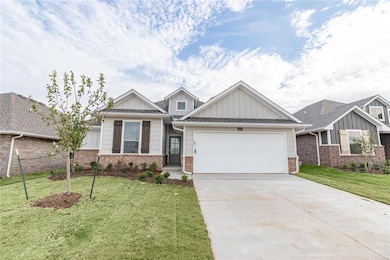 Craftsman inspired home with board and batten siding, driveway, a garage, a front yard, and brick siding