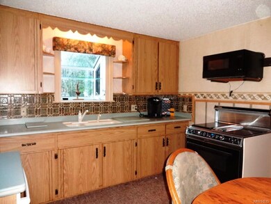 Corion tops, ceramic splash and oak faced cabinets