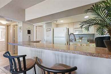 Kitchen featuring a kitchen breakfast bar, recesse